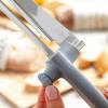 BREAD KNIFE WITH ADJUSTABLE CUTTING GUIDE