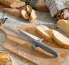 BREAD KNIFE WITH ADJUSTABLE CUTTING GUIDE
