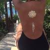 TEMPORARY TATTOOS SHINE IN WHI